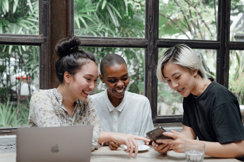 Young workers at a cafe with laptop